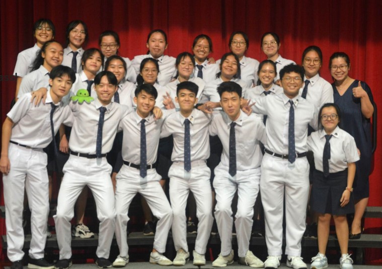 Magdalene in a group picture with her junior college classmates