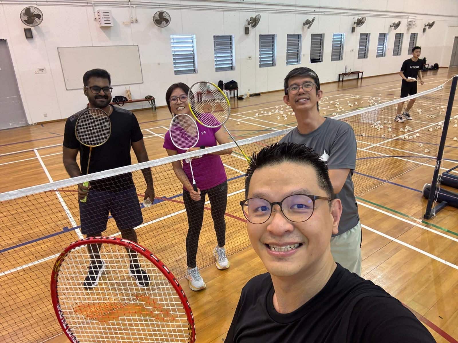 Vinid and his friends enjoying badminton.