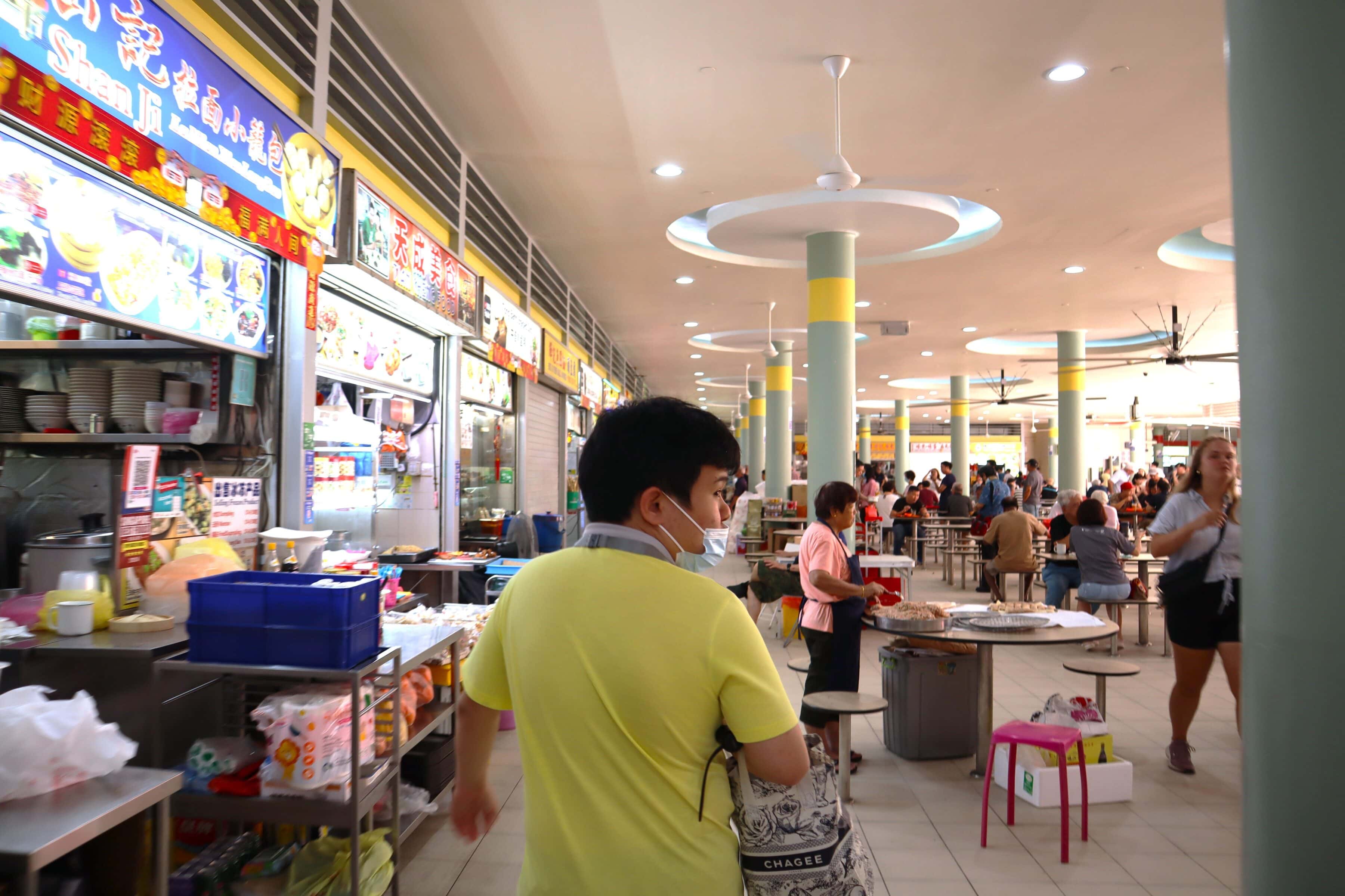 Joel’s independence, built one step and one stitch at a time 3 Joel at a hawker centre
