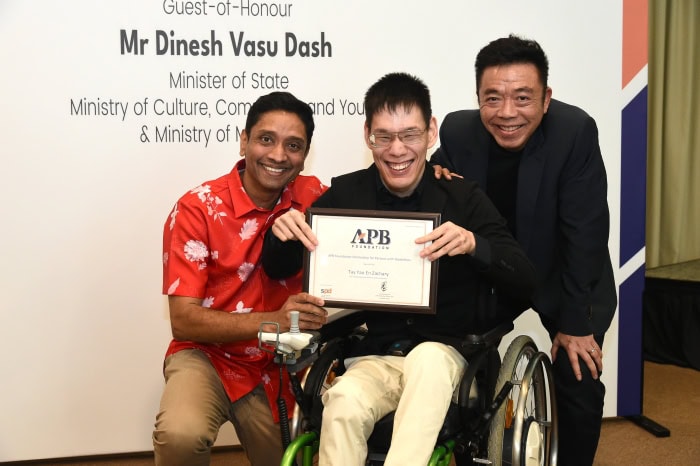 Gamer to Game-Changer: How Zachary is championing accessible technology 4 Zachary at the APB Foundation Scholarship award ceremony receiving the certificate from Guest-of-Honour Mr Dinesh Vasu Dash, Minister of State for Culture, Community and Youth & Ministry of Manpower, and Mr Kenneth Choo, Chairman, Board of Trustees, A P B Foundation and Managing Director, HEINEKEN Asia Pacific.