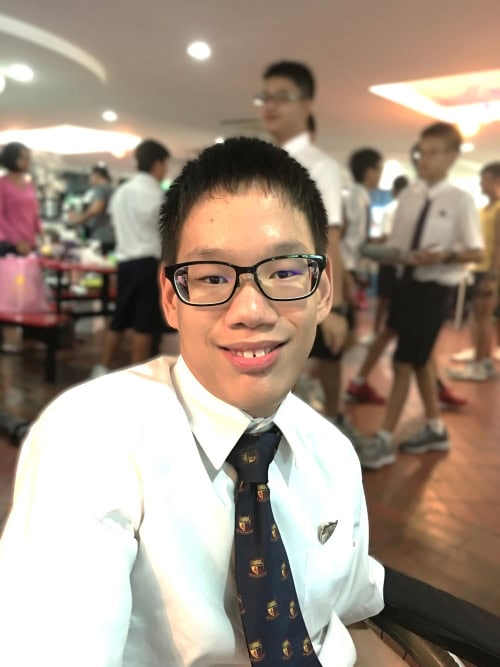 Gamer to Game-Changer: How Zachary is championing accessible technology 1 A younger Zachary in school uniform in the school canteen